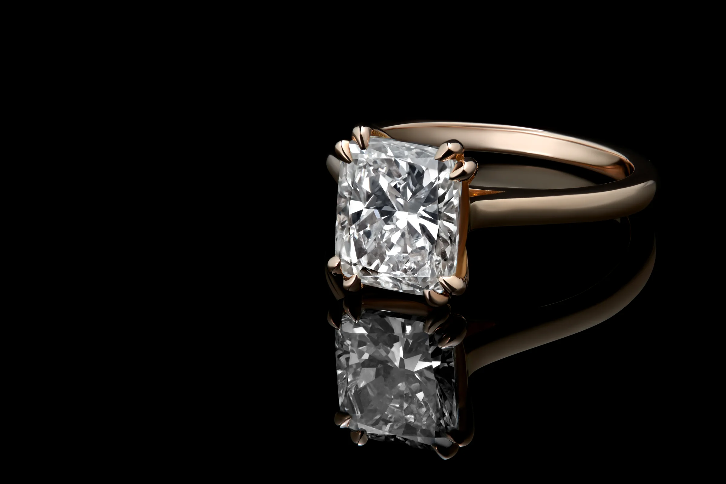 Diamond solitaire ring, reflected