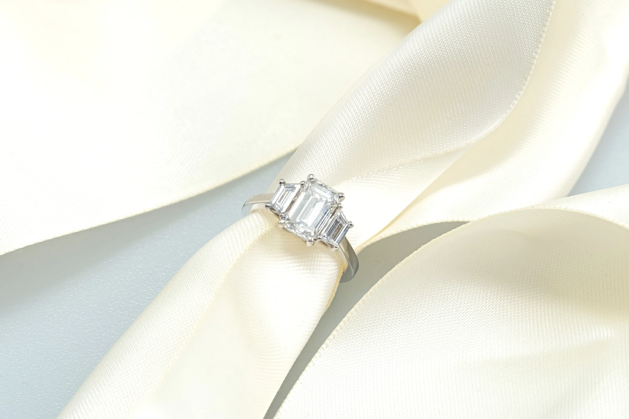 Diamond ring presented on ribbon